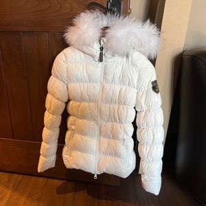 Puffy jacket with fur trimmed hood